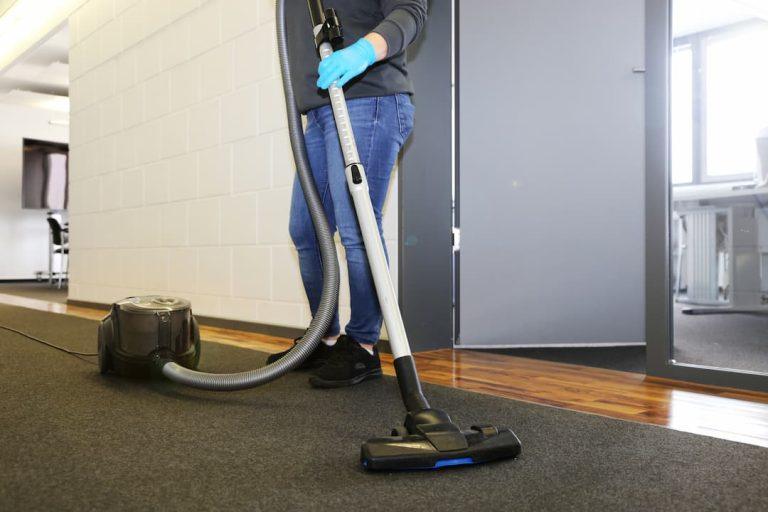 Vacuuming the office